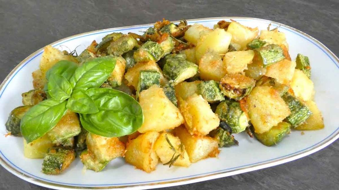 Pommes de terre et courgettes gratinées aux fines herbes: un