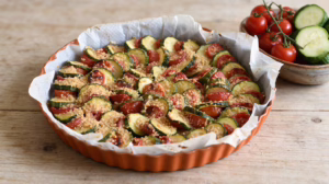 Gratin de courgettes et tomates cerises, une alternative savoureuse à la parmigiana qui séduit tous les palais